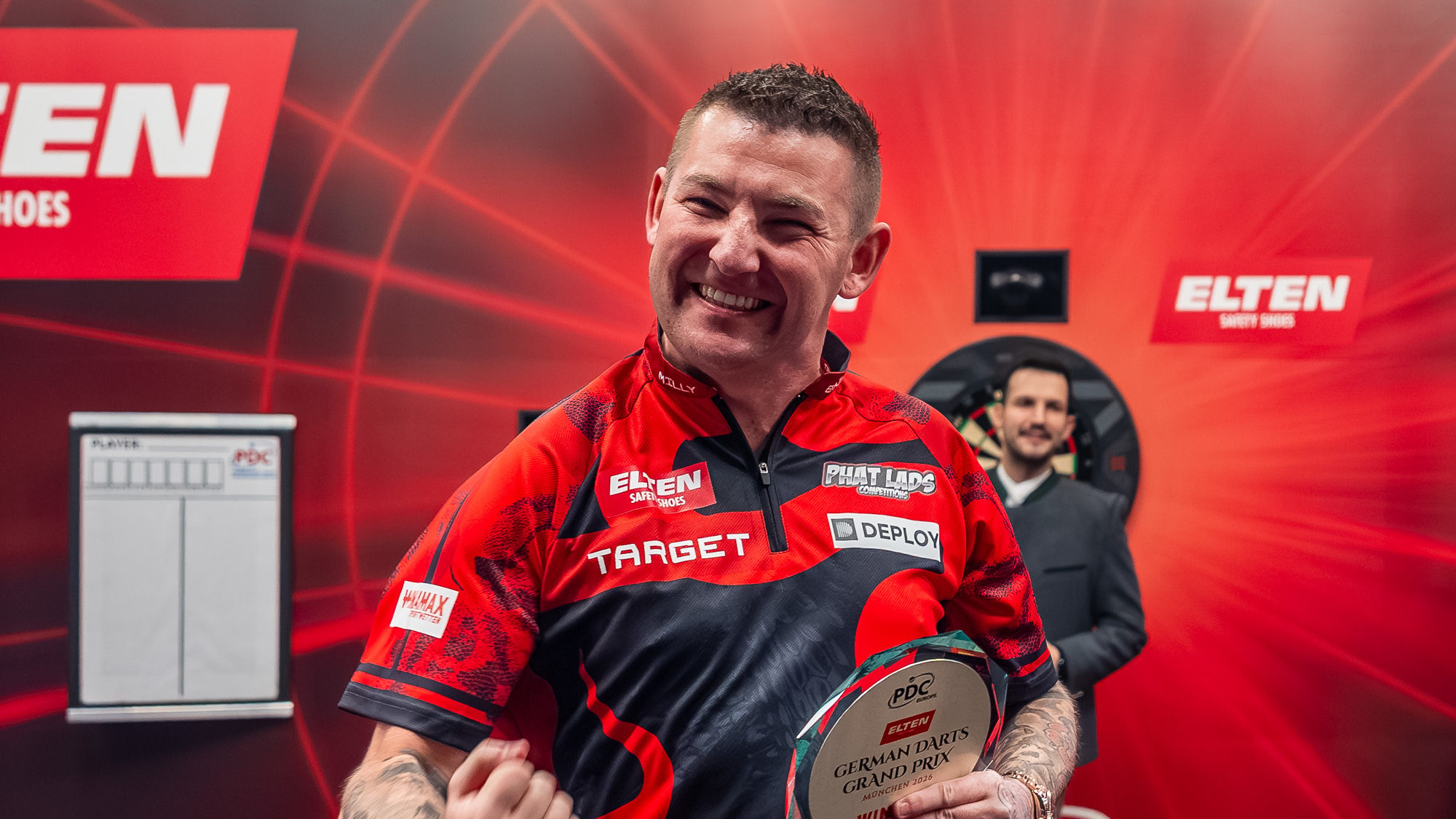 Nathan Aspinall gewinnt den ELTEN Safety Shoes German Darts Grand Prix 2026 im Zenith in München.