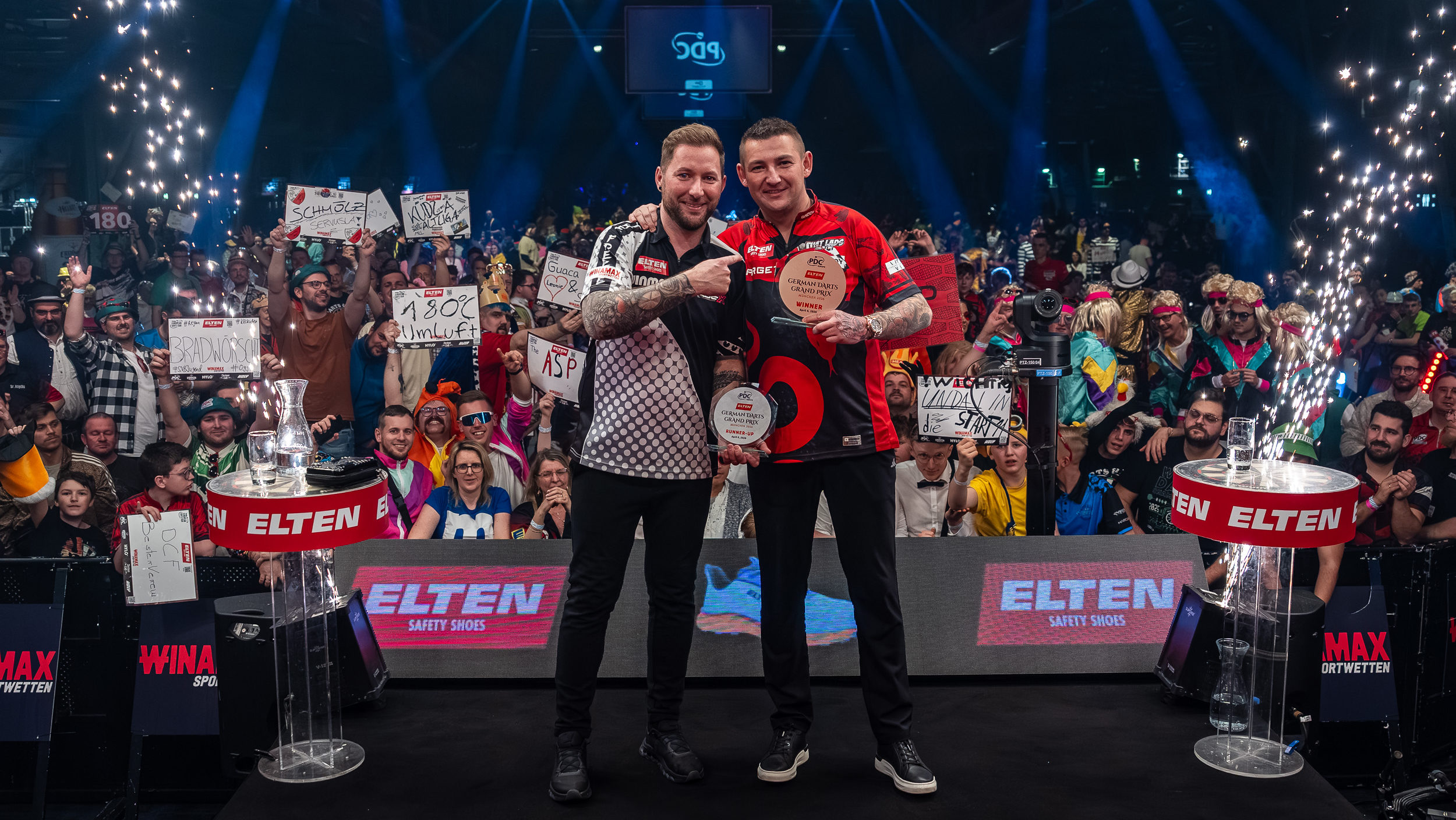 Nathan Aspinall gewinnt den ELTEN Safety Shoes German Darts Grand Prix 2026 im Zenith in München. Danny Noppert wird Zweiter.